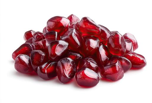 A pile of ruby-red pomegranate seeds photo