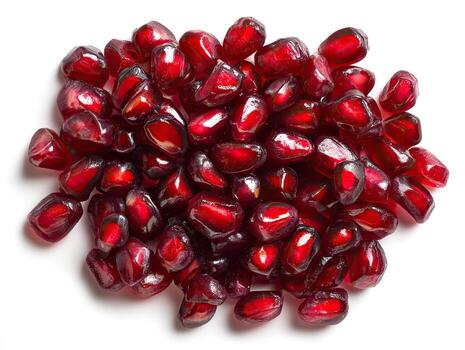 Pomegranate seeds, vibrant red, clustered photo