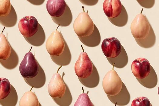 Overhead shot of many fruits, including pears and plums, on a neutral, beige background photo