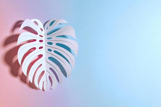 A stylized, white monstera leaf with dramatic shadows against a gradient pastel background photo