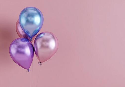 Four reflective balloons in various pastel colors float against a soft pink backdrop photo