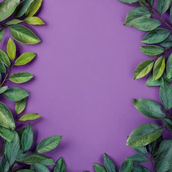Lush green leaves frame a vibrant purple backdrop, creating a botanical border photo