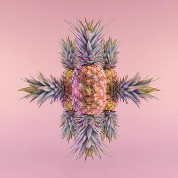 Symmetrical composition of pineapples arranged on a pink gradient background, cross-like formation photo
