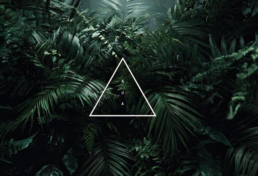 Lush green foliage densely packed, with a white triangle overlay containing text photo