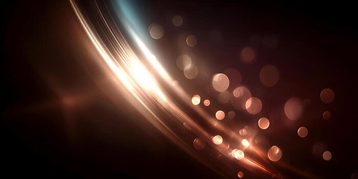 Dynamic gold and bronze light streaks flow across a dark background with sparkling bokeh effects photo
