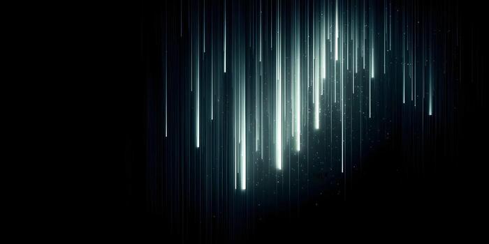 Bright cyan light streaks and glowing particles fall vertically against a dark black background creating an abstract digital rain effect photo