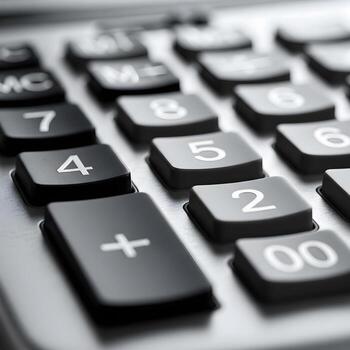 Intricate Macro View of a Calculator's Keys with Elegant Metallic Reflections and Soft Bokeh, Highlighting Upscale Design Precision photo
