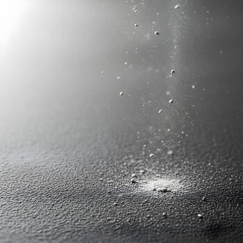 Elegant Macro Enchantment A Graceful Chalk Dust Cascade Emanating on a Rich Textured, Artistic Surface Under Subtle Natural Soft Lighting photo