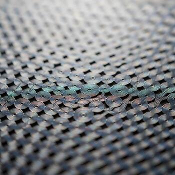 Captivating Macro View of Metallic Nanostructures Exquisitely Detailed, Intricate Patterns Illuminated by Soft Ambient Light with Gently Blurred Dreamlike Backgrounds photo