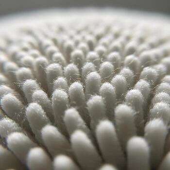 un delicado macro exploración de el suave, mullido microfibras iluminado por difundido natural ligero en contra un sereno, tranquilo, minimalista fondo. foto