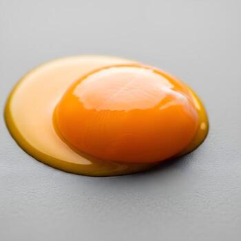 Elegant Macro Fusion Vivid Yolk Merges With a Matte Textured Surface, Radiating Under Soft Natural Light in an Intricate Display photo