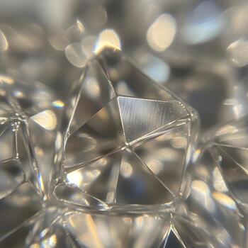 Macro Illumination Capturing Exquisite Iridescent Prism Facets in a Luxurious Dance of Sparkling Light, Intricate Texture, and Reflective Mystique Elegance photo