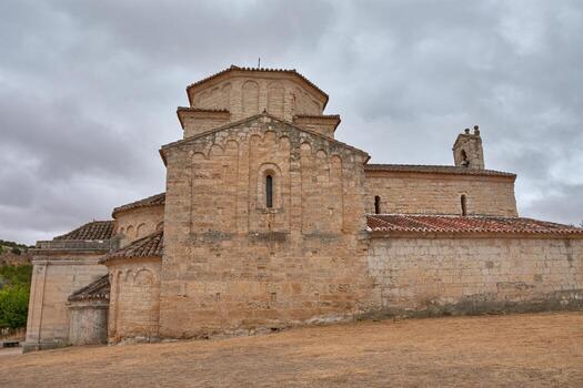 A cloudy day highlights the solidity of the Hermitage of Our Lady of the Annunciation, with its domes and apses photo