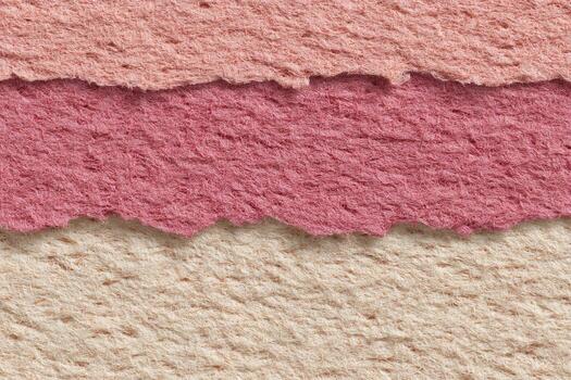 Textured paper layers in pastel shades photo