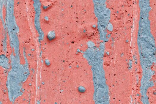 Textured Concrete Surface with Pink and Gray Paint photo