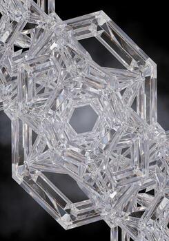 Close up of intricate crystal geometric structure with symmetrical diamond-like facets and abstract reflective pattern photo
