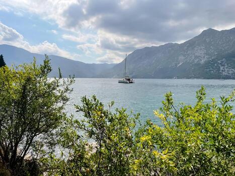 Breathtaking wide view of the winding bay framed by high peaks, often compared to Scandinavian fjords but with a Mediterranean charm. photo