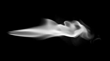 Smoke Drifting Slowly Against a Black Background During the Day video