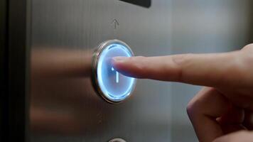 Elevator Up Button Pressed in Building Lobby at Night video