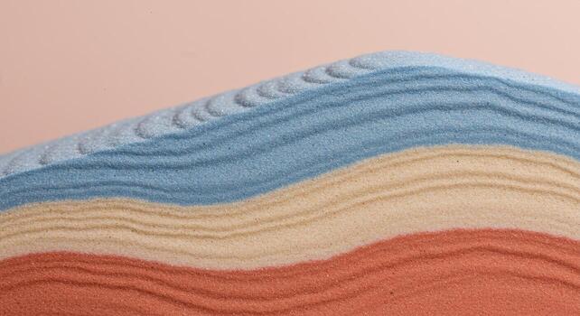 un calma y hermosa resumen antecedentes presentando el amable patrones de en capas arena. el suave colores y detallado textura crear un sereno y orgánico composición foto