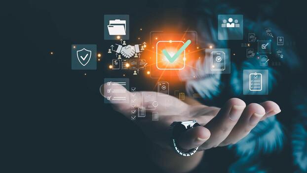 Hand presenting glowing checkmark icon surrounded by business, security, and document holographic symbols on dark background. Concept of digital verification and successful completion. photo