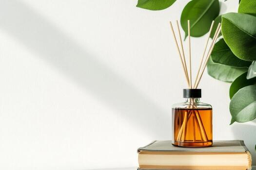 Decorative Diffuser and Stacked Books Create a Cozy Atmosphere in a Modern Setting. photo