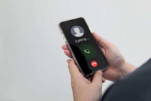 A smartphone with mobile screen showing a calling. Concept of communication, and conversation with a telephone network. photo