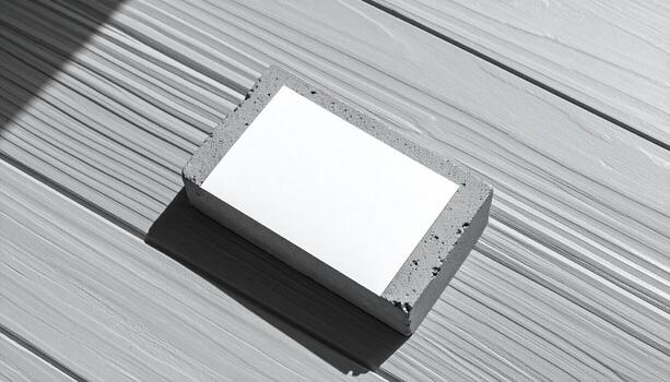 minimalista negro y blanco Bosquejo hormigón bloquear con blanco blanco tarjeta en madera superficie foto