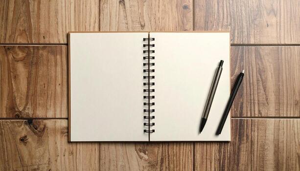 Blank Notebook Open with Pens on Wooden Desk Ideal for Ideas Planning and Note Taking photo