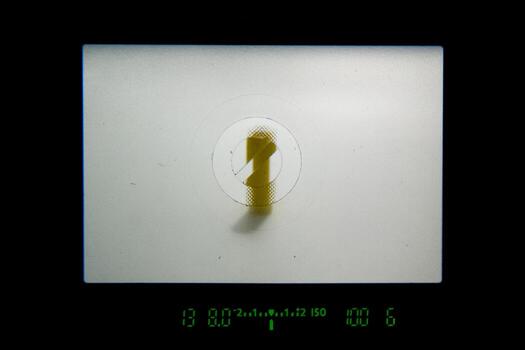 analog DSLR viewfinder with focusing screen with micro-prism and wedges - for manual focusing assistance and digital metering at the bottom photo