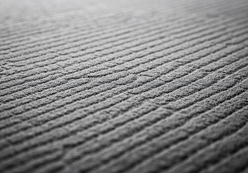 Closeup View of Textured Surface with Parallel Lines photo