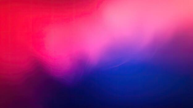Blurry features gradient of red, pink, and blue creating soft, dynamic visual photo