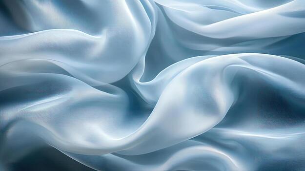 Smooth light blue satin fabric gently ripples creating abstract flowing shapes and gentle shadows throughout the background photo
