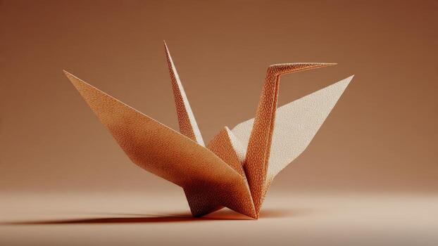 Delicate origami paper crane on a soft brown background casting subtle shadow photo