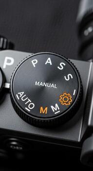 Close up of a camera s mode dial showing manual auto program aperture and shutter priority settings photo