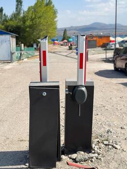 Broken barrier on the street, non working barrier photo