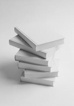 Minimalist stack of blank white hardcover books arranged in a tower, representing concepts of knowledge, education, and learning photo