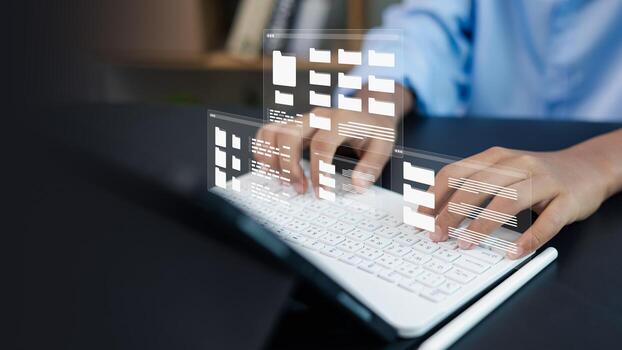 Hands typing on keyboard with digital file folder interface and cloud data management concept photo