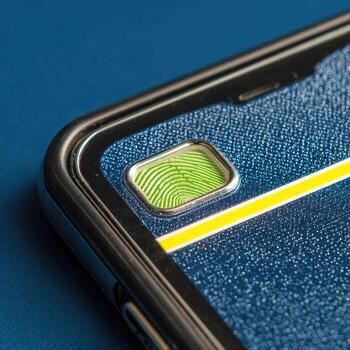 Close-up of a smartphone fingerprint sensor photo