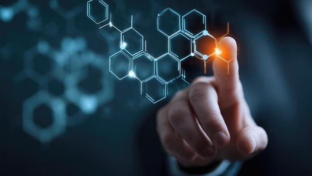 A hand interacts with glowing hexagonal molecular structure photo
