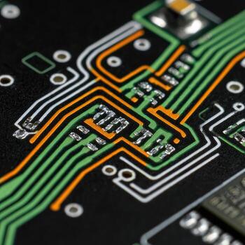 Close-up of intricate circuit board traces photo