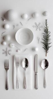Minimalist white Christmas table setting photo
