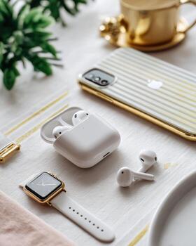 White tech accessories on a light table photo