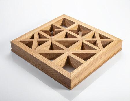 Geometric Wooden Puzzle Interlocking Triangles on White Background. photo