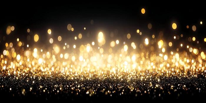 A dazzling display of golden glitter particles sparkles and shines against a dark background with bright bokeh lights photo