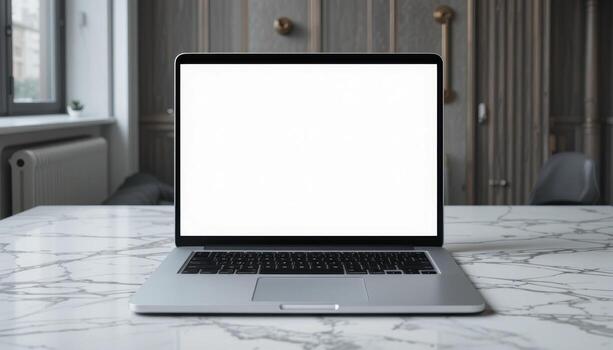 Empty Laptop on Marble Table in Modern Workspace During Daytime photo