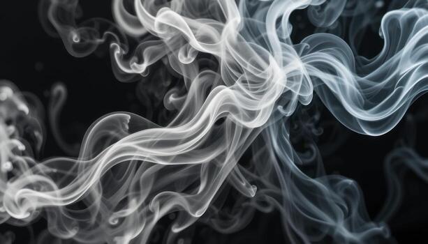 Swirling Patterns of Smoke Create an Ethereal Effect Against a Dark Background photo