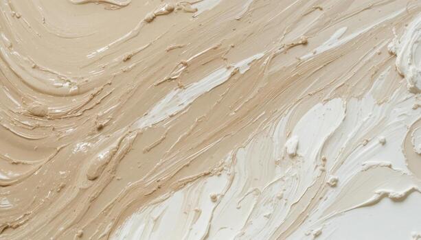 Swirls of Creamy Texture in Beige and White Create an Artistic Pattern on a Surface photo