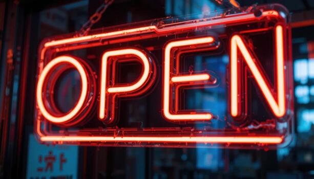 Bright Neon Open Sign Illuminating Storefront During Evening Hours photo