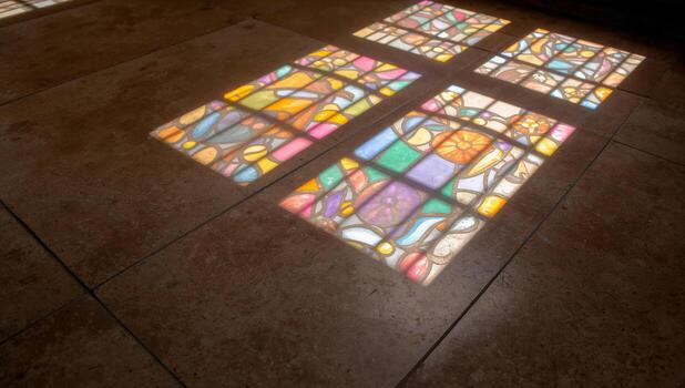 Sunlight Filtering Through Stained Glass Creating Patterns photo